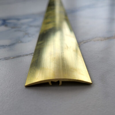 Listwa wykończeniowa, mosiężna - SMD RAMP L. Delikatnie zaokrąglona listwa wykończeniowa do dekoracji i niwelowania różnic w poziomach podłóg.